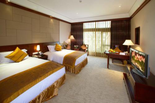 Crowne Plaza Hangzhou Xanadu Resort Quarto foto